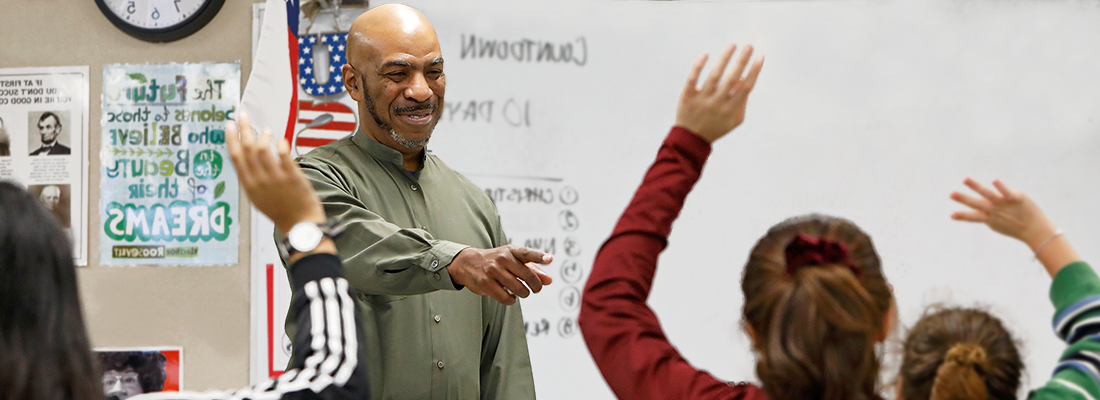 Teacher in a high school classroom